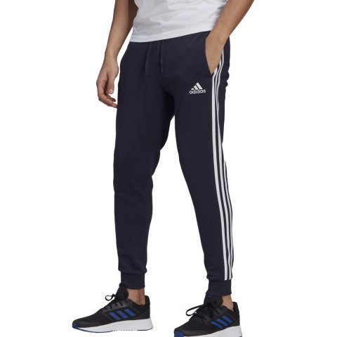 Spodnie męskie adidas Essentials Slim 3 Stripes Pants granatowe GM1090 Spodnie męskie adidas Essentials Slim 3 Stripes Pants granatowe GM1090