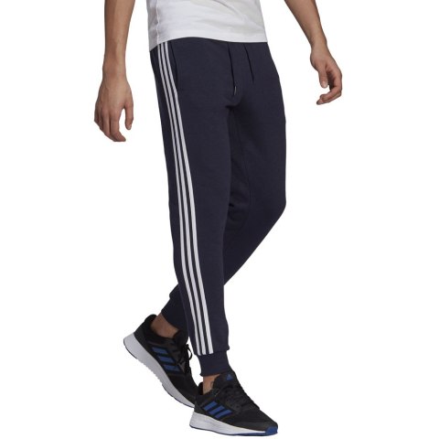 Spodnie męskie adidas Essentials Slim 3 Stripes Pants granatowe GM1090 Spodnie męskie adidas Essentials Slim 3 Stripes Pants granatowe GM1090