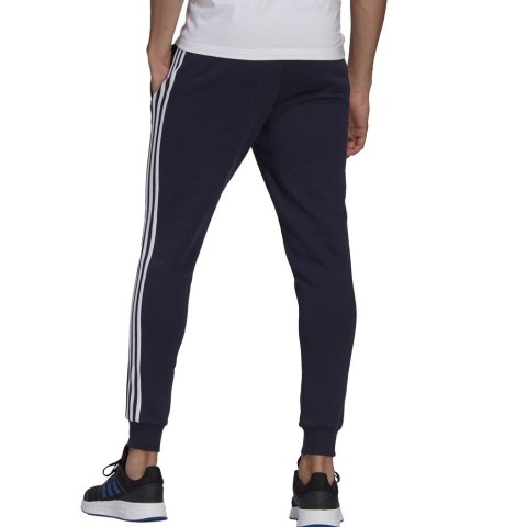 Spodnie męskie adidas Essentials Slim 3 Stripes Pants granatowe GM1090 Spodnie męskie adidas Essentials Slim 3 Stripes Pants granatowe GM1090