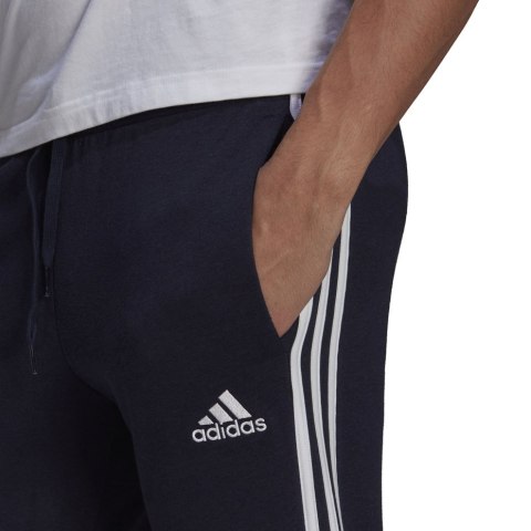 Spodnie męskie adidas Essentials Slim 3 Stripes Pants granatowe GM1090 Spodnie męskie adidas Essentials Slim 3 Stripes Pants granatowe GM1090