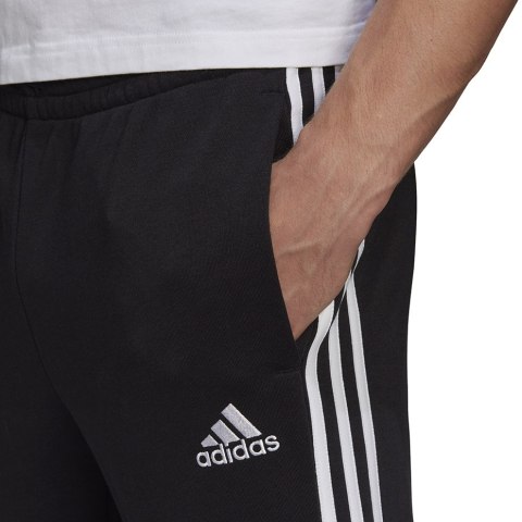 Spodnie męskie adidas Essentials Tapered Cuff 3 Stripes czarne GK8831 Spodnie męskie adidas Essentials Tapered Cuff 3 Stripes czarne GK8831