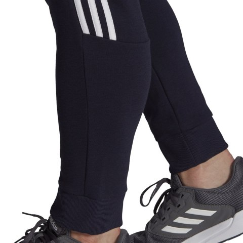 Spodnie męskie adidas Essentials Tapered Cuff 3 Stripes granatowe GK8977 Spodnie męskie adidas Essentials Tapered Cuff 3 Stripes granatowe GK8977