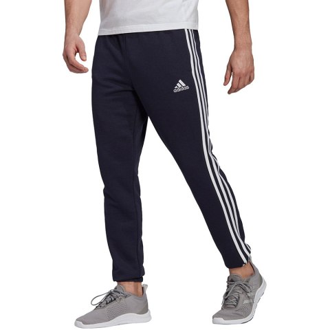 Spodnie męskie adidas Essentials Tapered Elastic Cuff 3 Stripes Pant granatowe GK8830 Spodnie męskie adidas Essentials Tapered Elastic Cuff 3 Stripes Pant granatowe GK8830