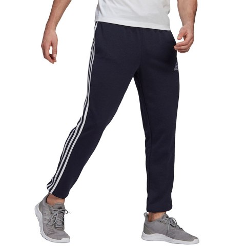 Spodnie męskie adidas Essentials Tapered Elastic Cuff 3 Stripes Pant granatowe GK8830 Spodnie męskie adidas Essentials Tapered Elastic Cuff 3 Stripes Pant granatowe GK8830
