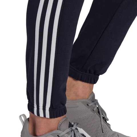 Spodnie męskie adidas Essentials Tapered Elastic Cuff 3 Stripes Pant granatowe GK8830 Spodnie męskie adidas Essentials Tapered Elastic Cuff 3 Stripes Pant granatowe GK8830