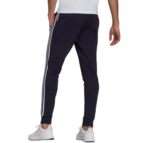 Spodnie męskie adidas Essentials Fleece Tapered Cuff 3-Band Pants granatowe GK8823 Spodnie męskie adidas Essentials Fleece Tapered Cuff 3-Band Pants granatowe GK8823