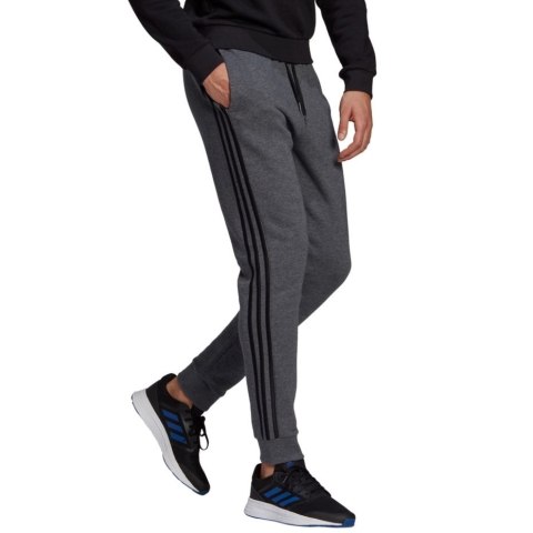 Spodnie męskie adidas Essentials Tapered Cuff 3 Stripes ciemnoszare GK8826 Spodnie męskie adidas Essentials Tapered Cuff 3 Stripes ciemnoszare GK8826