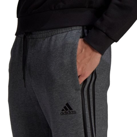 Spodnie męskie adidas Essentials Tapered Cuff 3 Stripes ciemnoszare GK8826 Spodnie męskie adidas Essentials Tapered Cuff 3 Stripes ciemnoszare GK8826