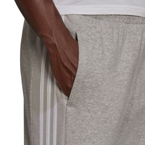 Spodnie damskie adidas Essentials Colorblock Block Cut 3-Stripes Regular Tapered Pants szare HB2768 Spodnie damskie adidas Essentials Colorblock Block Cut 3-Stripes Regular Tapered Pants szare HB2768