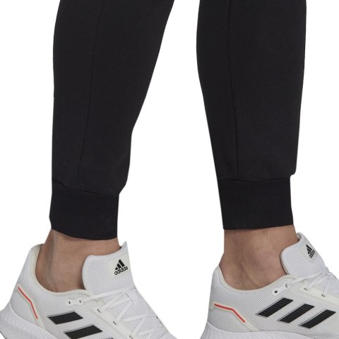 Spodnie męskie adidas Essentials Fleece Regular Tapered czarne HL2236 Spodnie męskie adidas Essentials Fleece Regular Tapered czarne HL2236