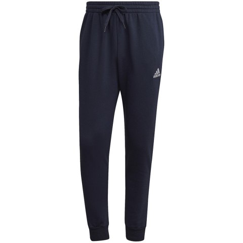 Spodnie męskie adidas Essentials Fleece Regular Tapered granatowe HL2231 Spodnie męskie adidas Essentials Fleece Regular Tapered granatowe HL2231