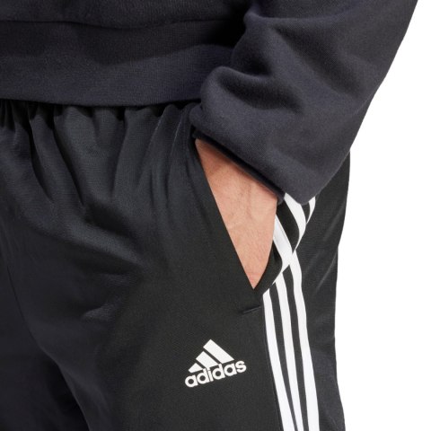 Spodnie męskie adidas Primegreen Essentials Warm-Up Tapered 3-Stripes Track czarne H46105 Spodnie męskie adidas Primegreen Essentials Warm-Up Tapered 3-Stripes Track czarne H46105