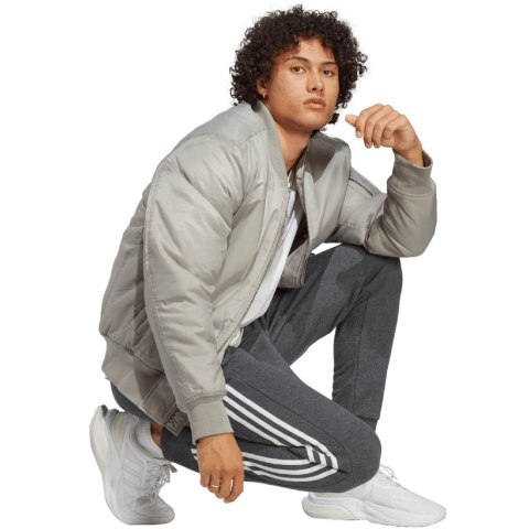 Spodnie męskie adidas Essentials French Terry Tapered Cuff 3-Stripes szare IC9408 Spodnie męskie adidas Essentials French Terry Tapered Cuff 3-Stripes szare IC9408
