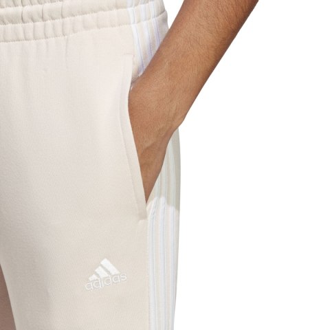 Spodnie damskie adidas Essentials 3-Stripes French Terry Cuffed kremowe IC9924 Spodnie damskie adidas Essentials 3-Stripes French Terry Cuffed kremowe IC9924