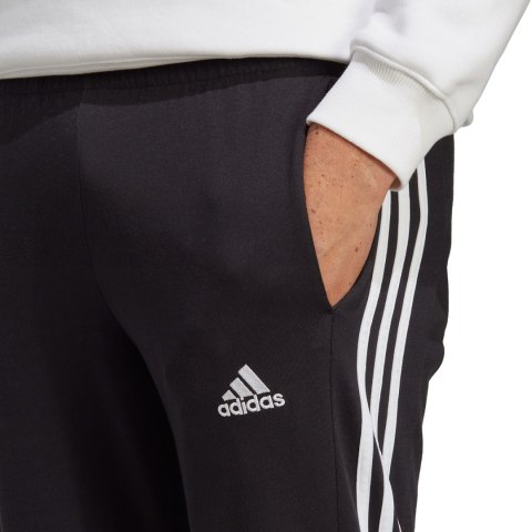 Spodnie męskie adidas Essentials Single Jersey Tapered Open Hem 3-Stripes czarne IC0044 Spodnie męskie adidas Essentials Single Jersey Tapered Open Hem 3-Stripes czarne IC0044
