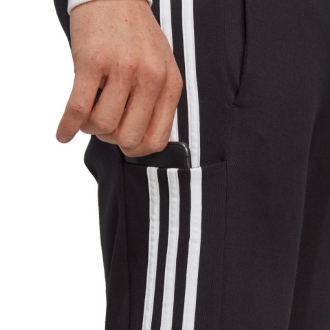 Spodnie męskie adidas Essentials Single Jersey Tapered Open Hem 3-Stripes czarne IC0044 Spodnie męskie adidas Essentials Single Jersey Tapered Open Hem 3-Stripes czarne IC0044