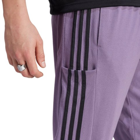 Spodnie męskie adidas Essentials Single Jersey Tapered Open Hem 3-Stripes fioletowe IJ8699 Spodnie męskie adidas Essentials Single Jersey Tapered Open Hem 3-Stripes fioletowe IJ8699