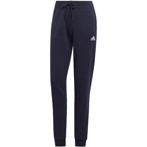 Spodnie damskie adidas Essentials Linear French Terry Cuffed granatowe IC6869 Spodnie damskie adidas Essentials Linear French Terry Cuffed granatowe IC6869