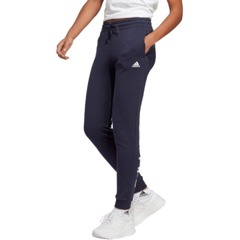 Spodnie damskie adidas Essentials Linear French Terry Cuffed granatowe IC6869 Spodnie damskie adidas Essentials Linear French Terry Cuffed granatowe IC6869