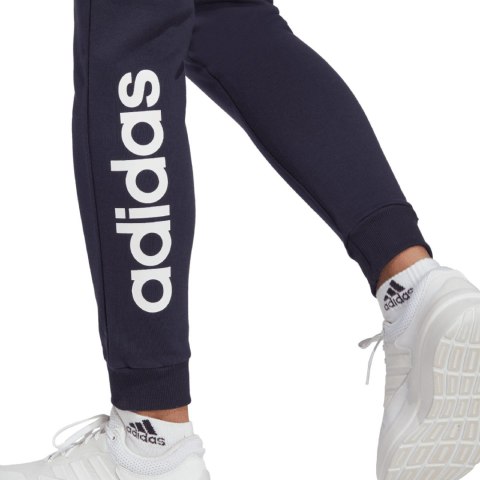 Spodnie damskie adidas Essentials Linear French Terry Cuffed granatowe IC6869 Spodnie damskie adidas Essentials Linear French Terry Cuffed granatowe IC6869