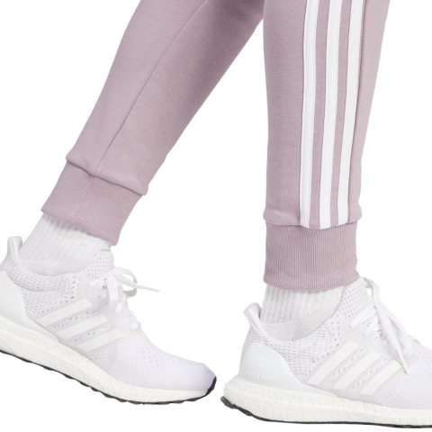 Spodnie damskie adidas Essentials 3-Stripes Fleece fioletowe IR5403 Spodnie damskie adidas Essentials 3-Stripes Fleece fioletowe IR5403