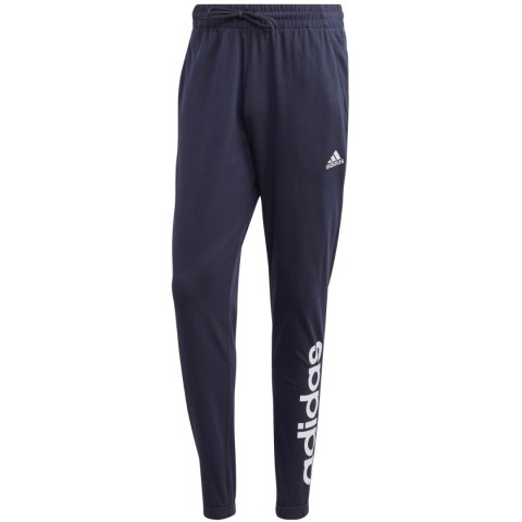 Spodnie męskie adidas Essentials Single Jersey Tapered Elasticized Cuff Logo granatowe IC0056 Spodnie męskie adidas Essentials Single Jersey Tapered Elasticized Cuff Logo granatowe IC0056