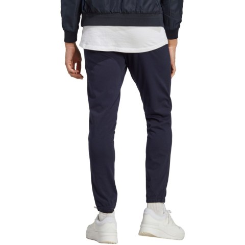 Spodnie męskie adidas Essentials Single Jersey Tapered Elasticized Cuff Logo granatowe IC0056 Spodnie męskie adidas Essentials Single Jersey Tapered Elasticized Cuff Logo granatowe IC0056