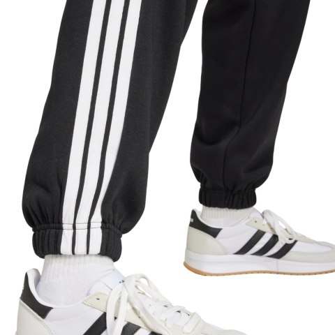 Spodnie damskie adidas Essentials 3-Stripes Fleece Loose-Fit czarne JE1276 Spodnie damskie adidas Essentials 3-Stripes Fleece Loose-Fit czarne JE1276