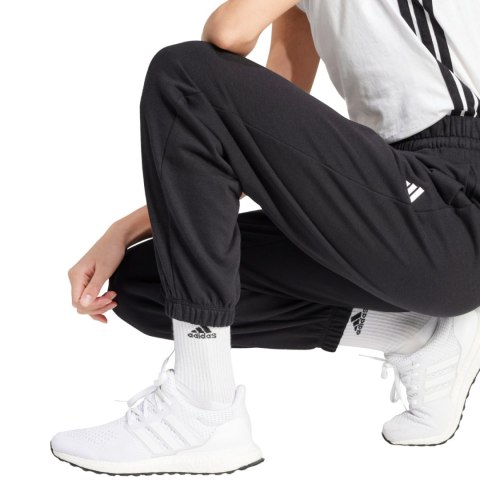Spodnie damskie adidas Essentials Small Logo French Terry Cuffed czarne JD7999 Spodnie damskie adidas Essentials Small Logo French Terry Cuffed czarne JD7999