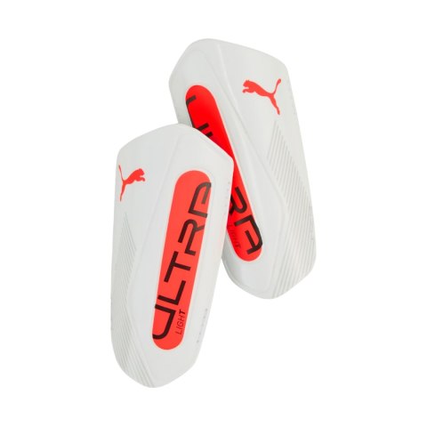 Ochraniacze piłkarskie Puma Ultra Light Strap biało-pomarańczowe 30992 01 Ochraniacze piłkarskie Puma Ultra Light Strap biało-pomarańczowe 30992 01